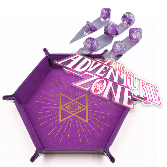 Purple hexagonal dice tray with gold foil design, the adventure zone logo clear car decal and a set of seven purple acrylic dice.
