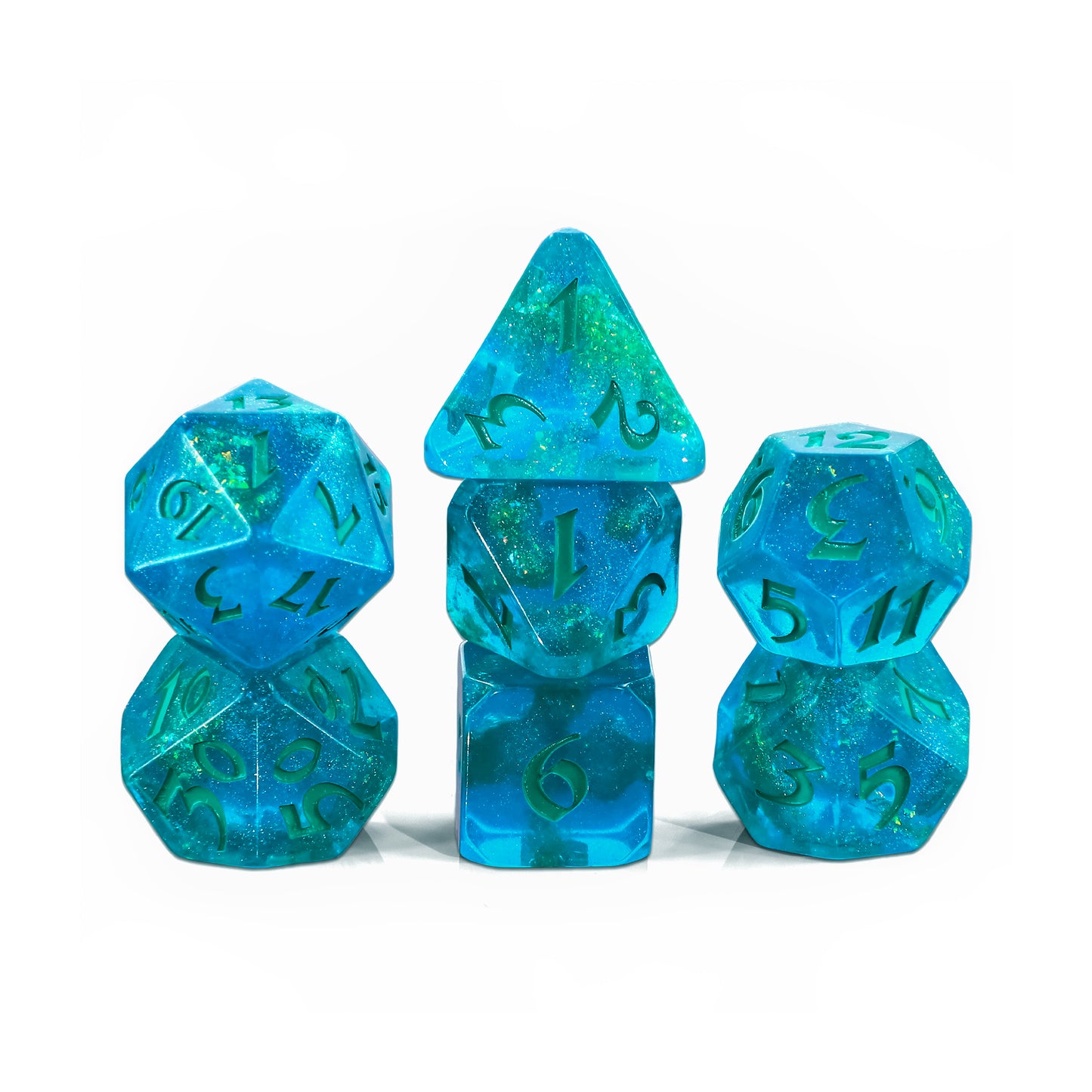 Aqua blue resin dice with seafoam green glitter throughout and matching seafoam green numbers. Dice displayed are 1 D4, 1 D6, 1 D8, 2 D10s, 1 D12, 1 D20.