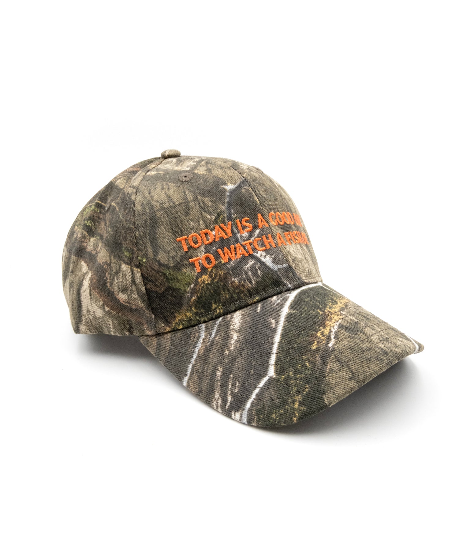 3/4 view of a camouflage cap with orange text that reads "Today is a good day to watch a fish die"