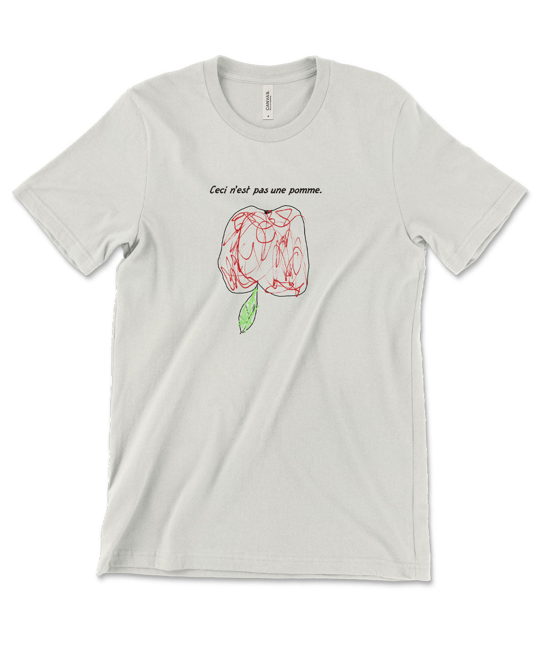 A mockup of a vintage white colored shirt with a scribbly illustration of an upside-down apple and the caption "Ceci n'est pas une pomme."