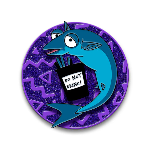 Blue mackerel fish with big bulging eyes holding a black cup that says DO NOT DRINK! They are affixed to a spinner on a purple metal pin with glitter enamel.