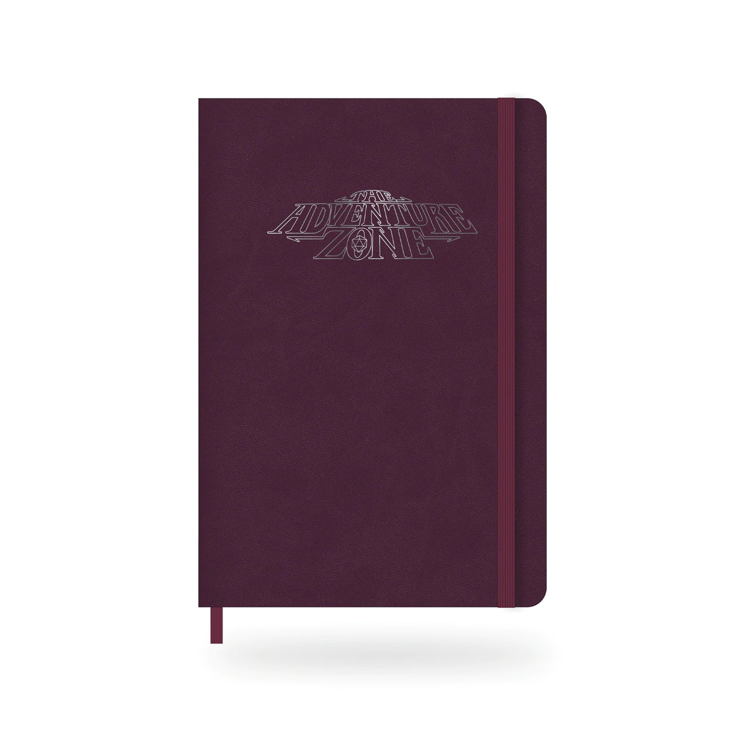 A maroon notebook embossed with the TAZ logo. It has an elastic band holding it shut.