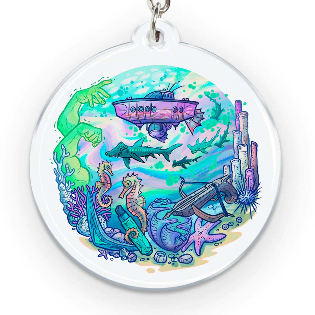 An acrylic keychain of the Coriolis cruising through the Ethersea. The water around the ship is a swirl of pink, white, and blue. There are five blinksharks swooping below the ship. To the left are Amber’s green spectral arms. At the bottom is a sandy sea floor with shells, coral, seahorses, and a crossbow.